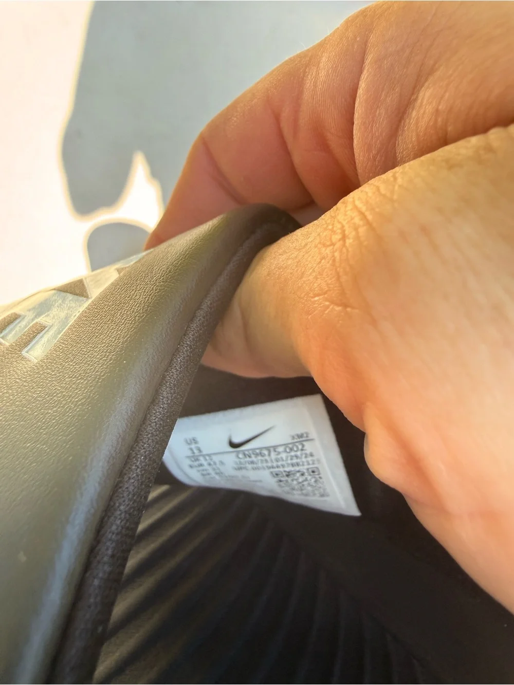 Men’s Nike Black Slides with White Logo